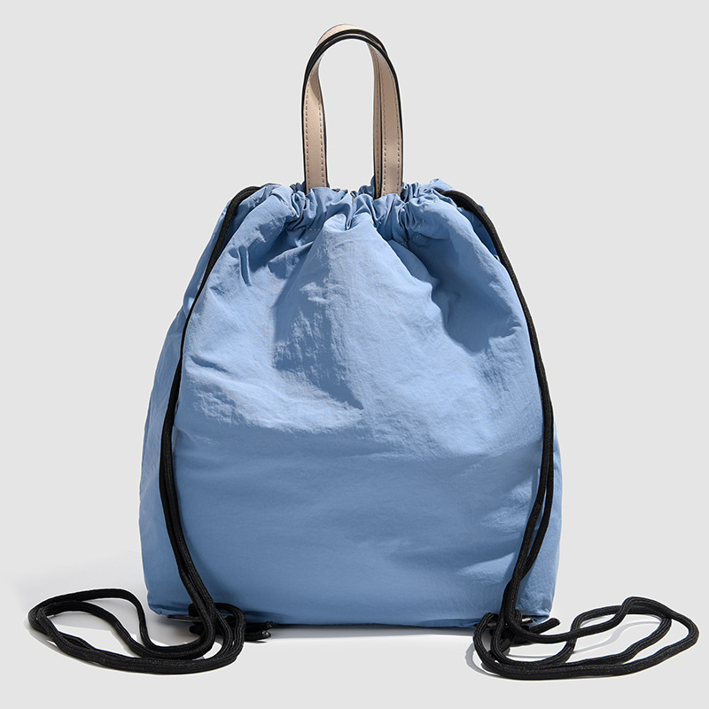 A new 2024 fashionable student backpack for women, a casual Korean-style backpack with drawstring pockets, and a travel bag Specification drawing