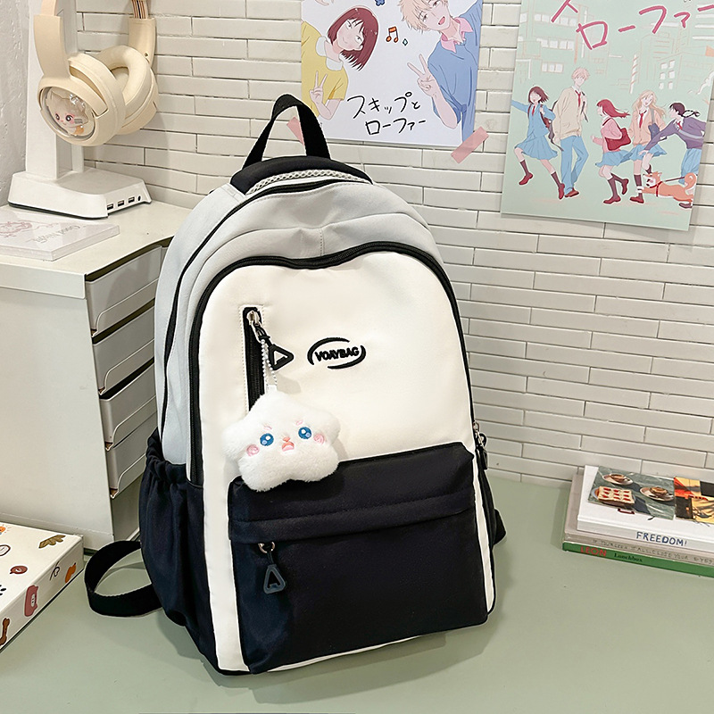 New Korean-style backpack for college students, large capacity, simple design, versatile backpack for junior high school students, and a high school girl bag Application Scenario