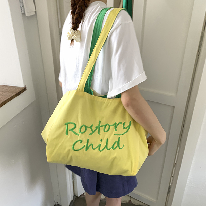 A trendy large-capacity tote bag for women, a new high-end textured embroidered single-shoulder canvas bag for student commuting in summer 2025 Specification drawing