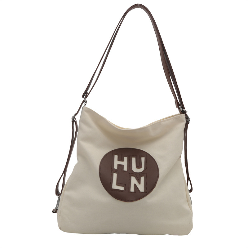 Women's large-capacity 2024 new letter-shaped canvas bag, fashionable single-shoulder bag, versatile commuter college student tote bag Item Picture