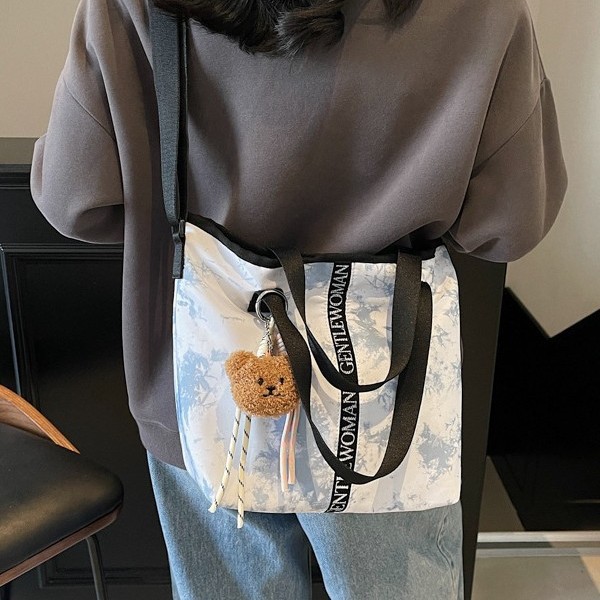 Large-capacity women's 2025 autumn new graffiti tie-dyed canvas handbag, fashionable and casual single-shoulder tote bag Specification drawing