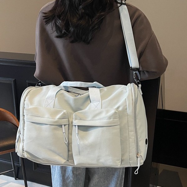 Large-capacity hand-held travel bags for men and women, long and short trips, business trips, sports bags, storage luggage bags, shoulder bags full figure