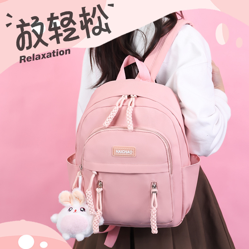 A versatile Japanese 2025 new travel mini backpack with large capacity, simple, light and cute for students full figure