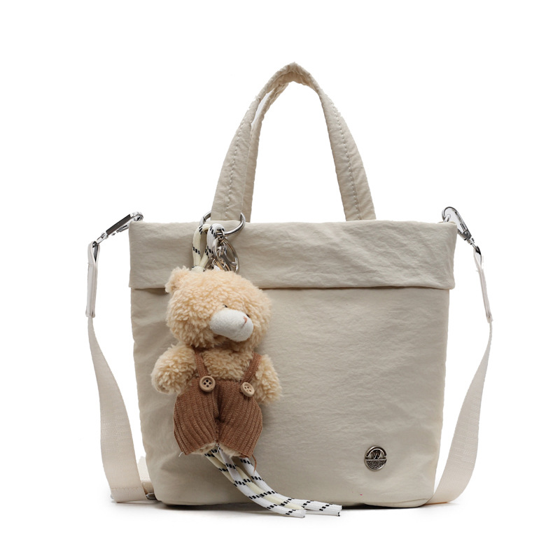 A new solid-color sporty and fashionable handbag from a trendy cartoon style, simple and water-resistant, casual and lightweight single-shoulder crossbody bag Item Picture