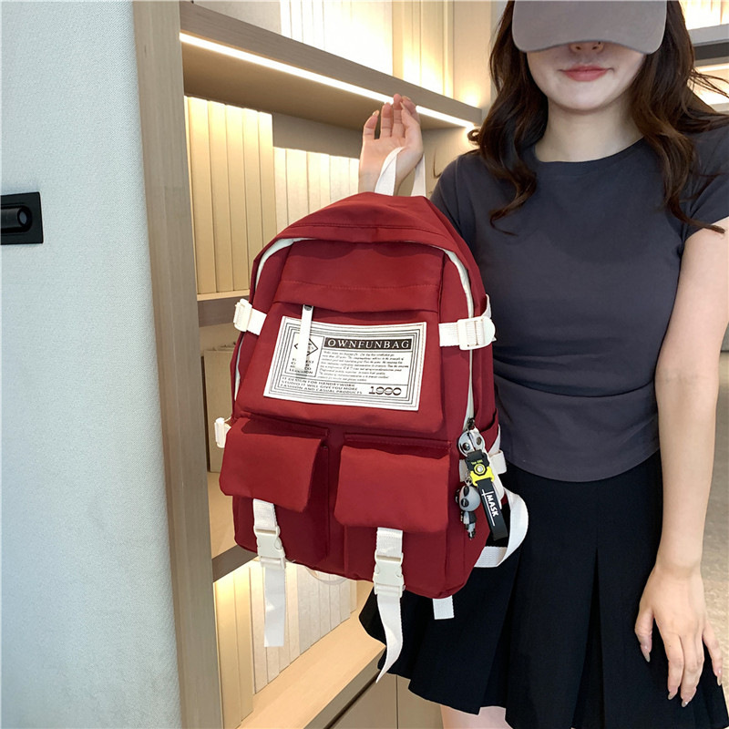 Workwear-style junior high school schoolbags for boys and girls, high appearance level computer bags, lightweight backpacks for high school and college students full figure