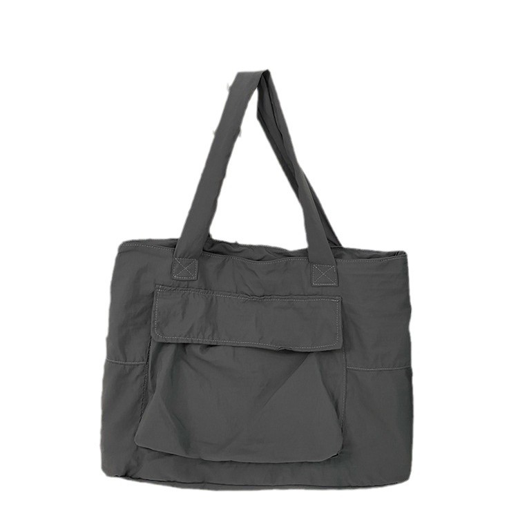 Simple single-shoulder tote bag, men's water-resistant lightweight hand-held large-capacity storage commuter bag, women's trendy nylon bag Item Picture