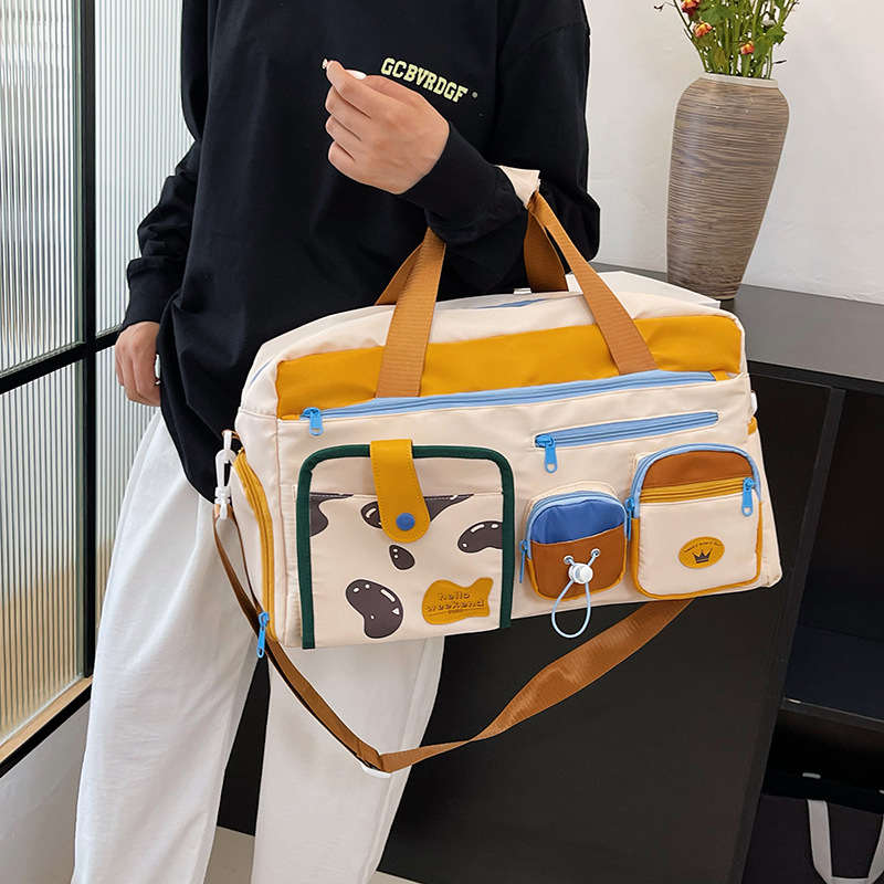 Fashionable single-shoulder crossbody fitness bag, large-capacity short-distance business trip luggage bag, dry and wet separated swimming training bag full figure