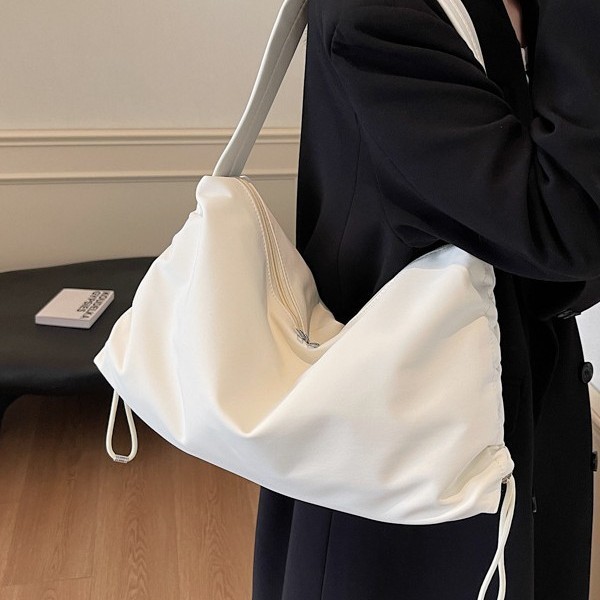 Autumn and winter high-capacity commuter Tote bag for women, 2024 new solid color fashionable drawstring single-shoulder bag, fabric bag full figure