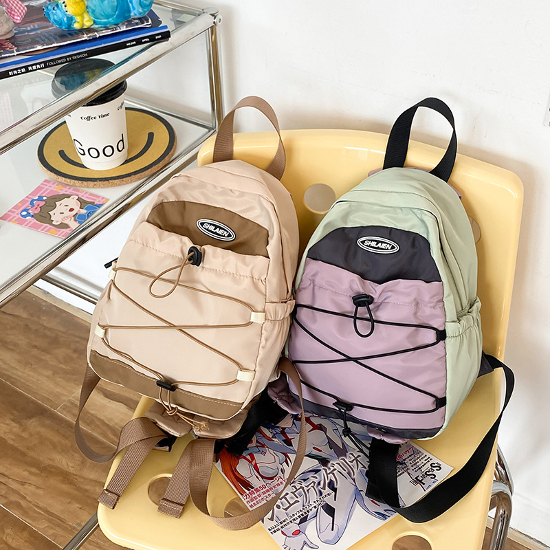 Mini fashionable outdoor travel bag, new Korean-style lightweight backpack for boys and girls, junior high school hiking backpack full figure