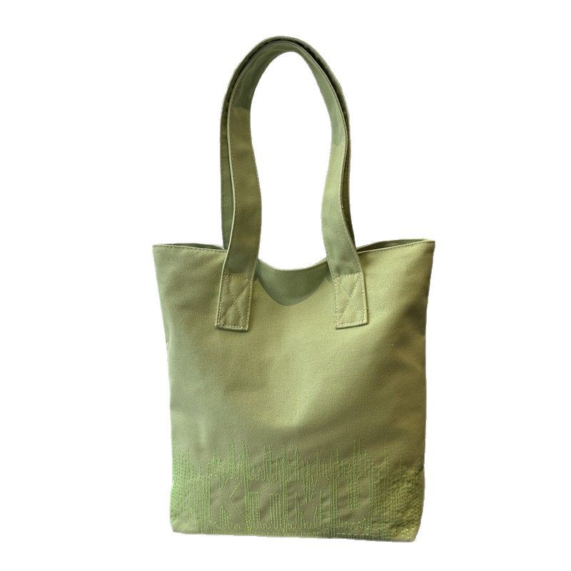 Fashionable and casual Korean-style embroidered canvas bag for women, 2024 new model student hand-held book bag for commuting, single-shoulder tote bag Item Picture