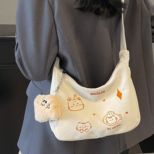2025 Large-capacity cartoon-printed single-shoulder underarm handbag for girls, fashionable Japanese style, cute crossbody bag, dumpling bag full figure
