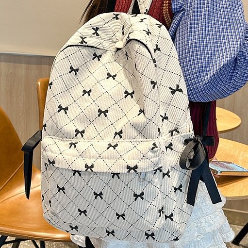 A new and versatile large-capacity student backpack with a fresh bow bow for autumn and winter Application Scenario