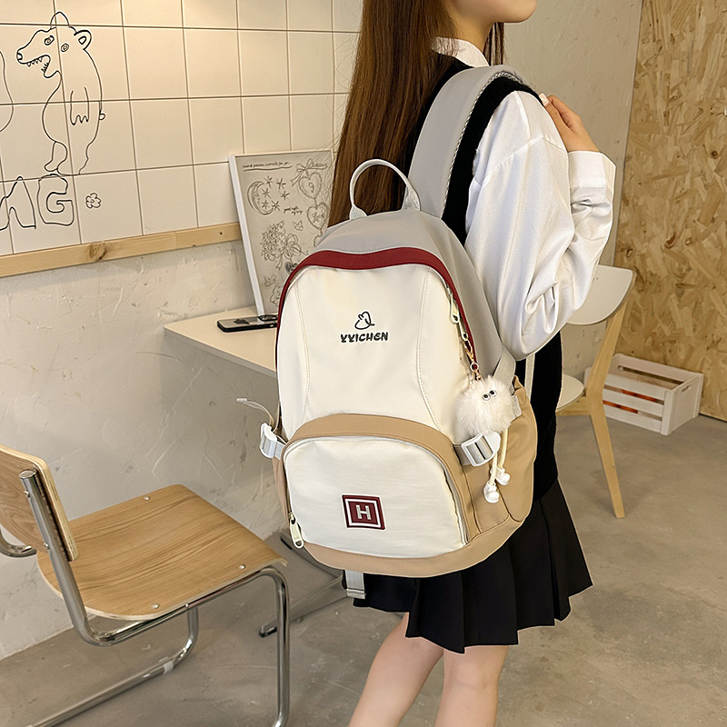 Korean-style lightweight backpack, cute and niche design for girls, a color-matched backpack for junior high school, senior high school and college students, and a women's travel backpack full figure
