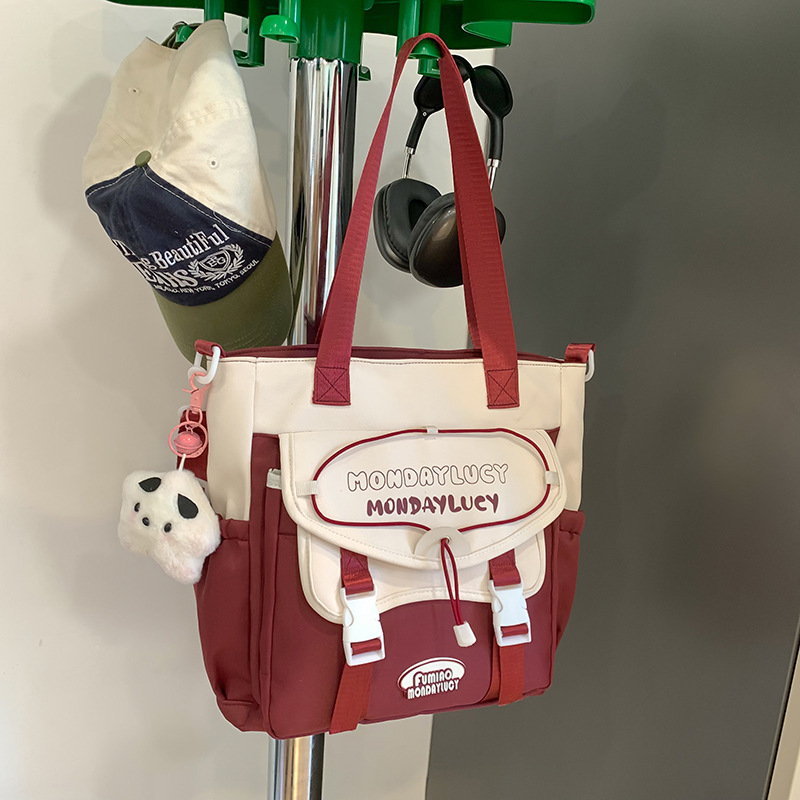 High appearance level Korean-style fresh and simple single-shoulder bag for junior high school students, color-blocking handbag, primary school student tutorial bag, canvas crossbody bag details Picture