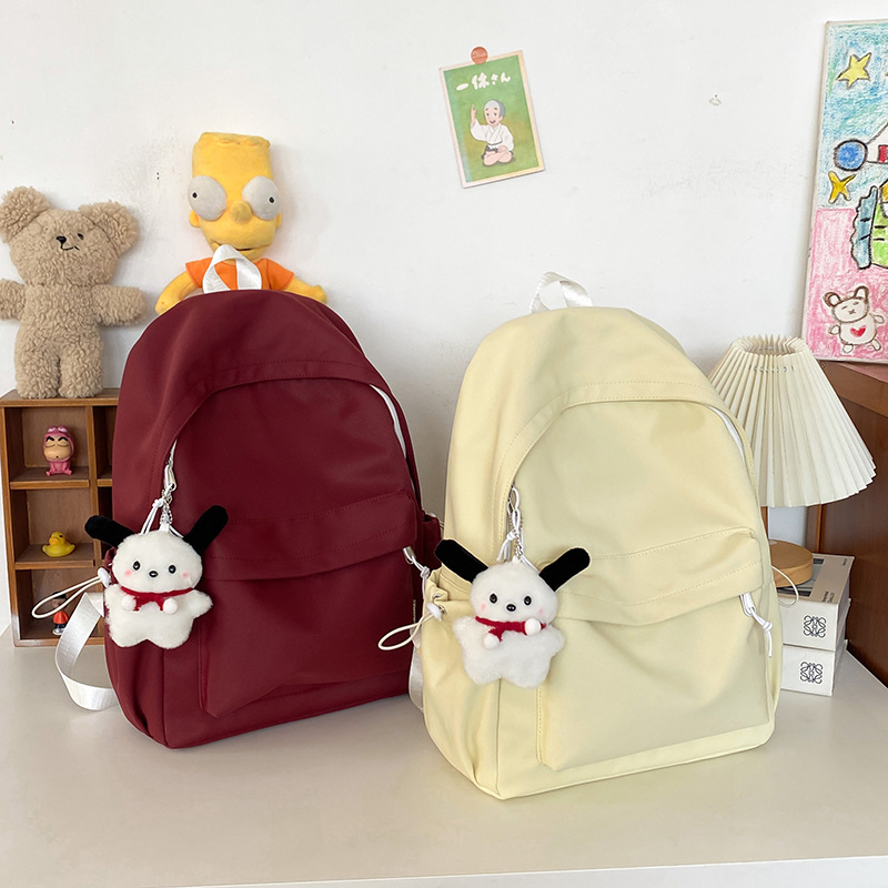 New cross-border schoolbag: Simple and large-capacity backpack for college students, casual solid-color backpack for high school and junior high school students Application Scenario