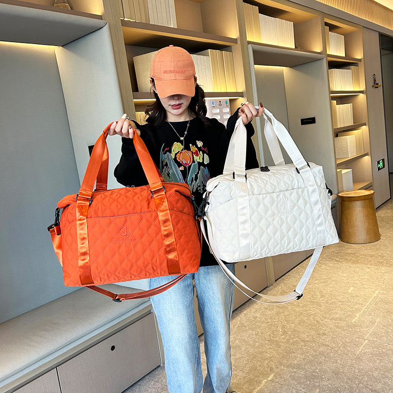 Wholesale of short-distance business trip hand-held travel bags for women, large-capacity lightweight sports and fitness bags that can be used with suitcases and luggage bags full figure