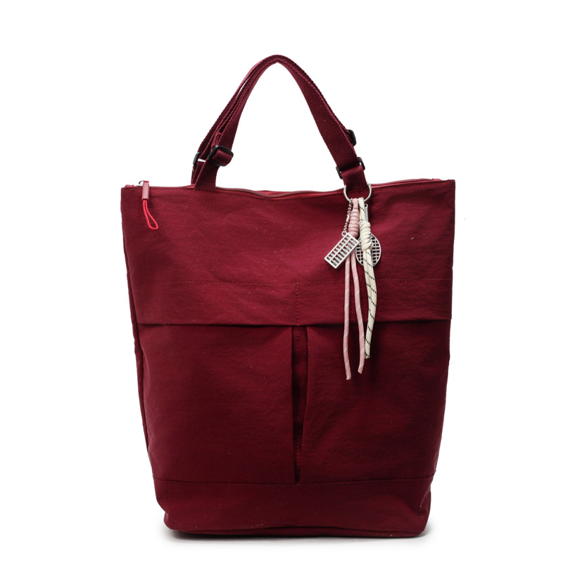 Casual large-capacity tote bag for women, 2024 winter, simple nylon fabric single-shoulder bag, versatile crossbody bag for school and commuting Item Picture
