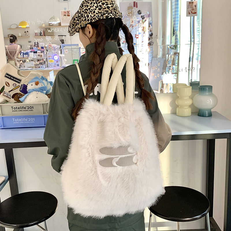Korean trendy large-capacity 2024 winter new fluffy backpack, niche hand-held backpack, single-shoulder tote bag details Picture