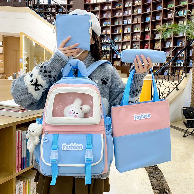 New forest-style versatile backpack for girls, four-piece set, large capacity, high appearance level, cute, lightweight and comfortable bag for middle school students full figure