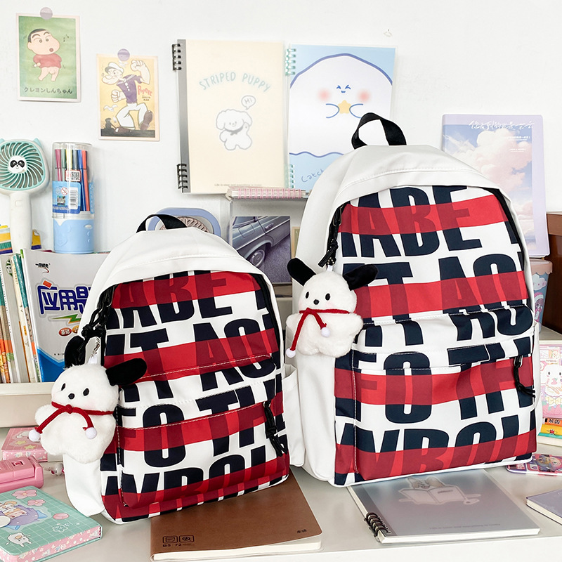 Cross-border Korean-style high-appearance-level dirt-resistant schoolbag, large-capacity men's and women's backpack, high school students' letter printed trendy schoolbag Application Scenario