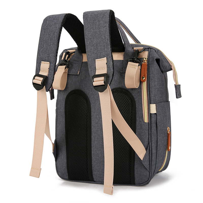 Mummy Bag with dry and wet separation, lightweight shoulder for going out, baby milk storage bag, retro multi-functional bed bag with baby stroller hanging Application Scenario