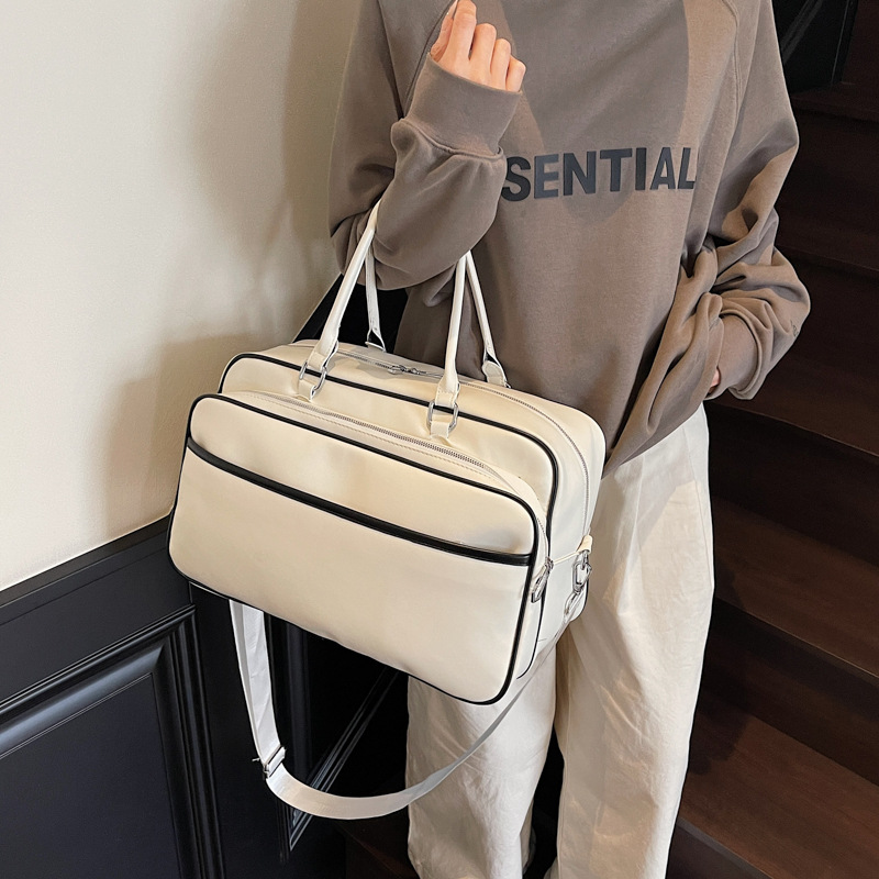 Large-capacity hand-held soft leather-like travel bag, business trip short-distance luggage bag, multi-layer storage, outdoor sports bag Application Scenario