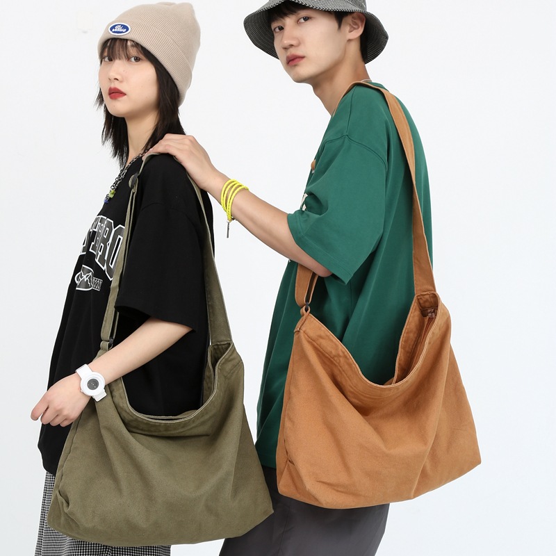 Order a new Japanese streetwear single-shoulder bag for women, a laid-back style solid color muji retro washed canvas bag full figure