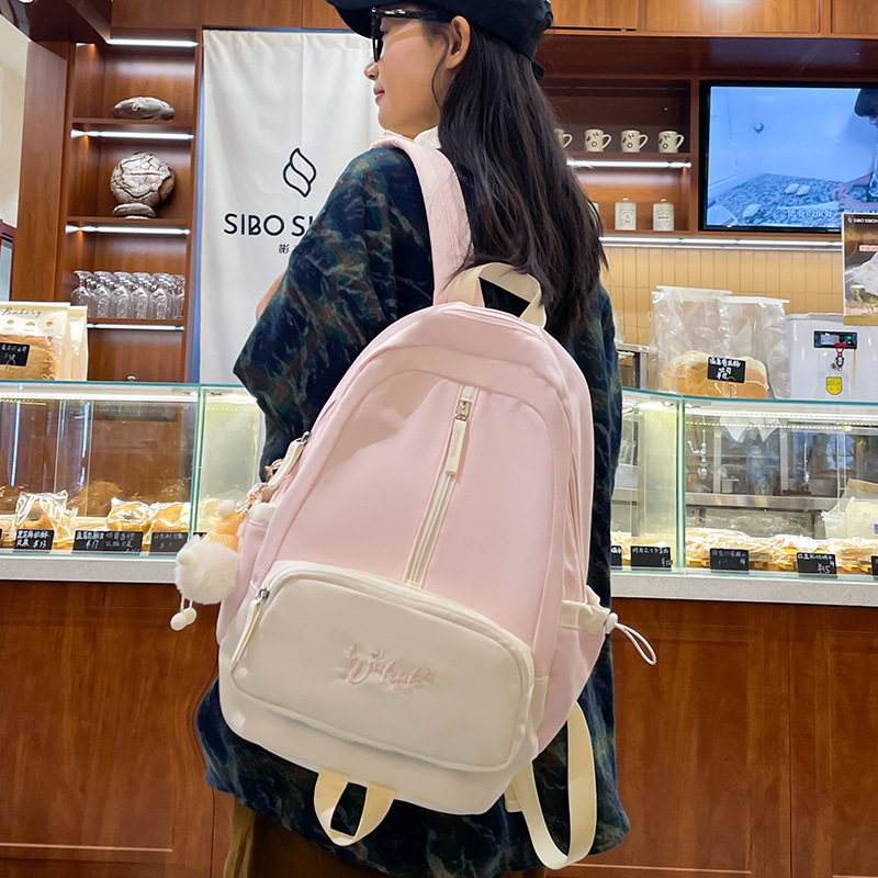 A female college student's Instagram-style forest-themed backpack with a high level of appearance and a soft girl. It features a color-blocking and versatile large-capacity campus backpack full figure