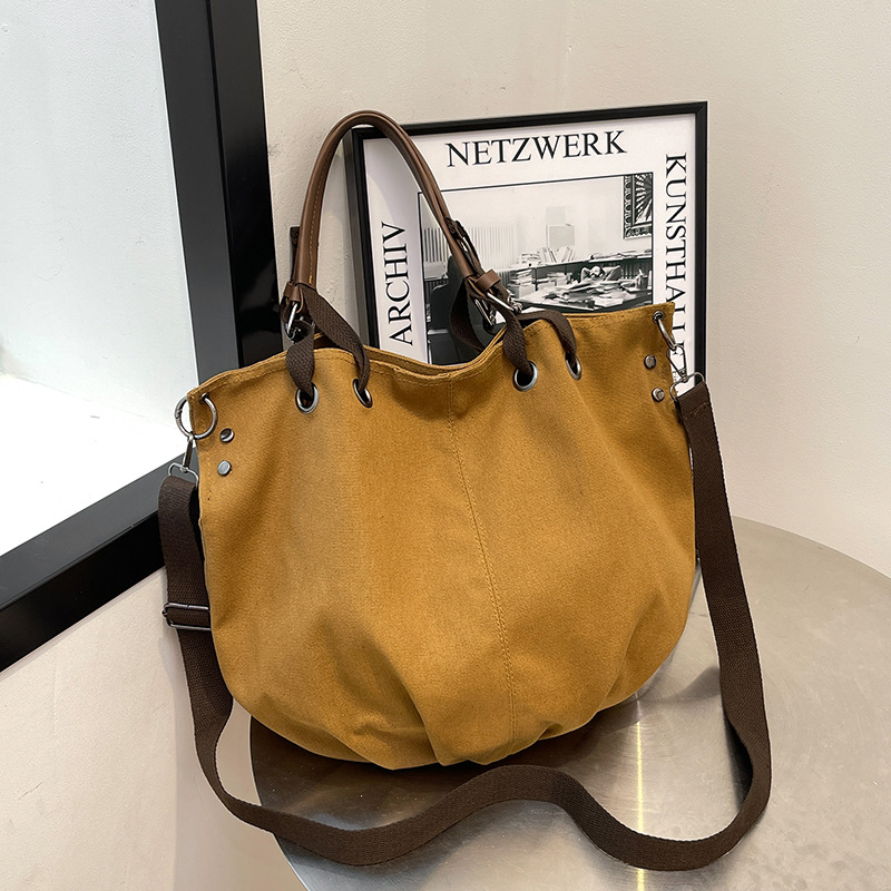 Japanese-style retro large-capacity work canvas bag, multi-functional single-shoulder crossbody bag, college student commuting hand-held tote bag full figure
