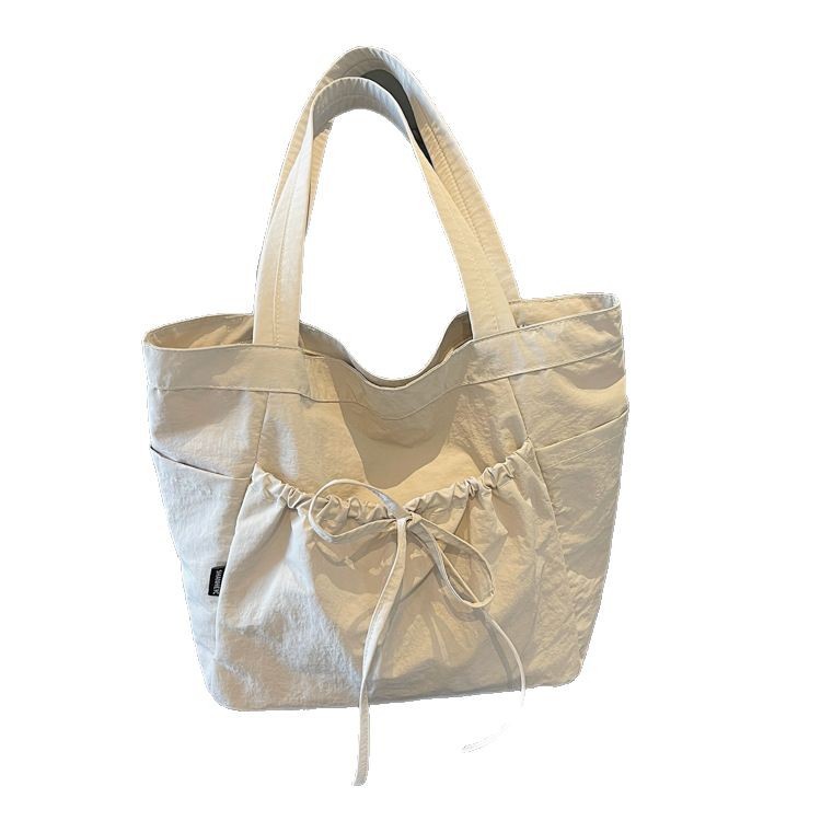 Japanese-style artistic large-capacity women's bag, lightweight nylon fabric bag, casual and versatile tote bag, college student class backpack Item Picture