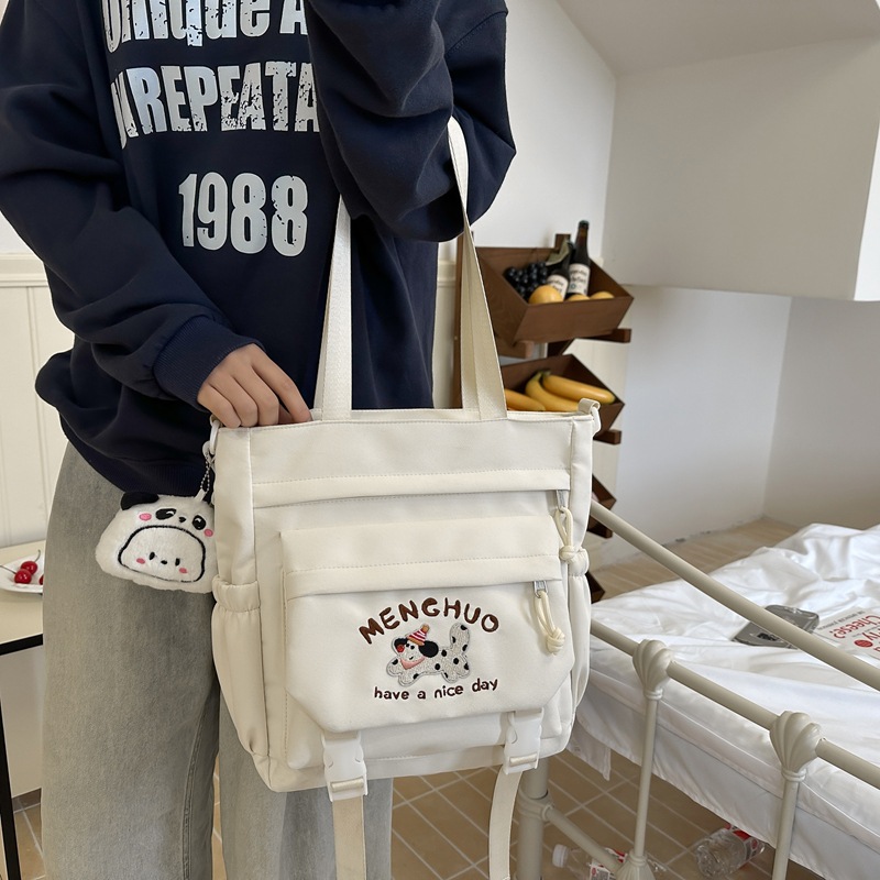 Japanese-style ins Academy style tote bag for junior high school students' classes, cute cartoon embroidered dog, large-capacity single-shoulder bag full figure