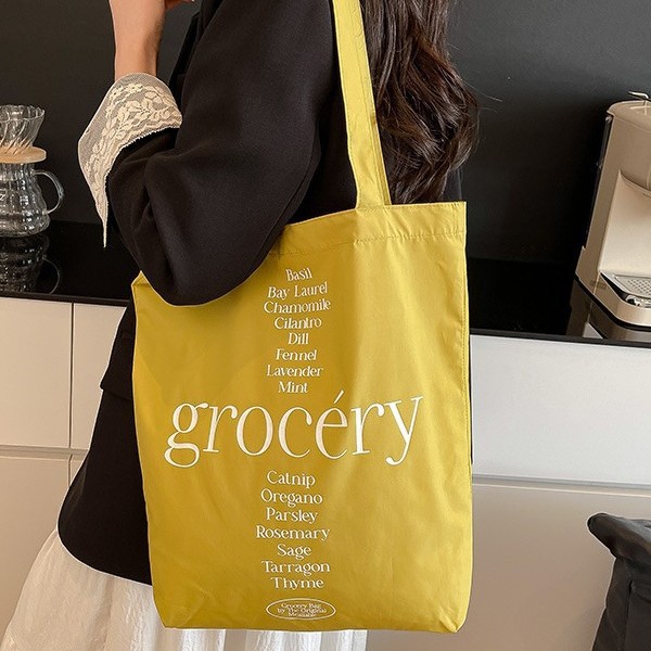 Korean sweet and simple canvas hand-held shoulder bag, student portable large-capacity lettered casual shopping canvas bag full figure