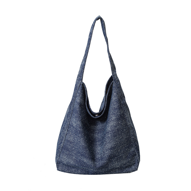 The 2025 new denim bag is a versatile large-capacity tote bag with a laid-back style for women. It is a simple single-shoulder bag for daily commuting Item Picture