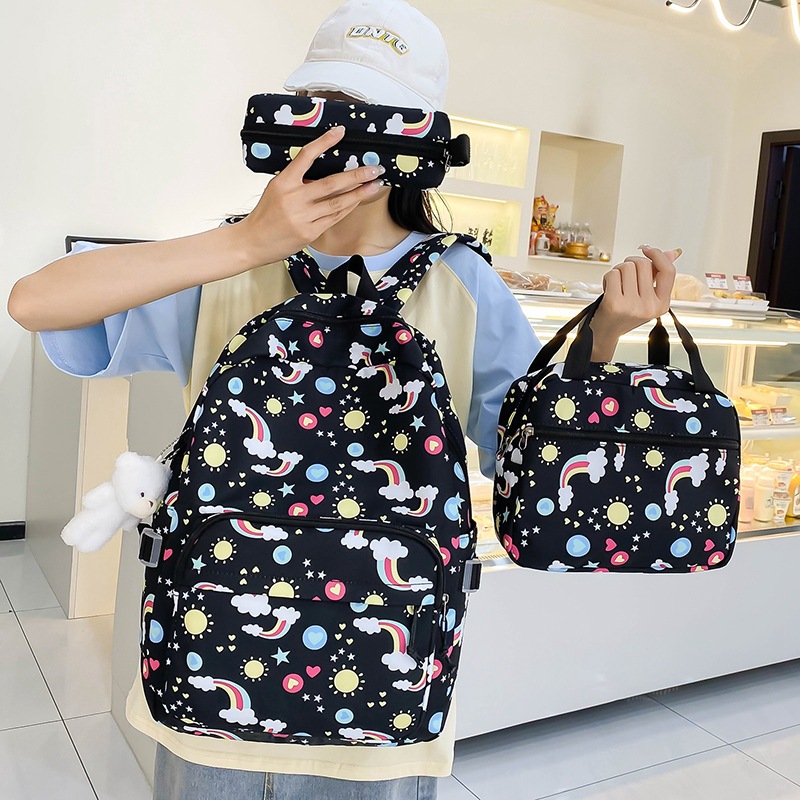 New cute junior high school and primary school students' backpack with reduced load, large-capacity backpack, girls' high school appearance level, casual backpack set of three pieces Application Scenario