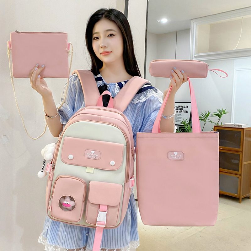 Campus four-piece set of schoolbag for junior high school students, a new Korean-style backpack with color contrast, and a large-capacity girls' backpack with reduced load full figure