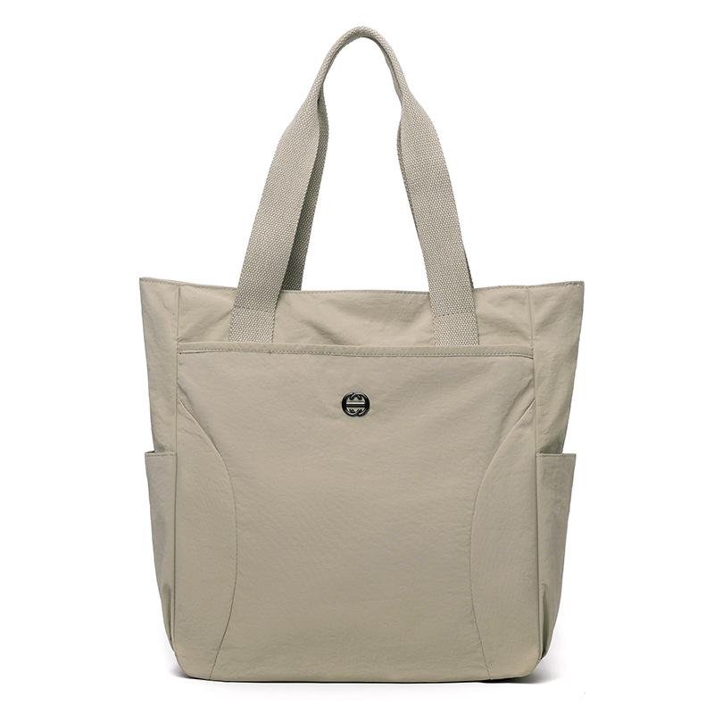 Large-capacity single-shoulder bag, simple and lightweight tote bag, tutorial bag, casual wash bag, nylon fabric bag, women's hand-held document bag Item Picture