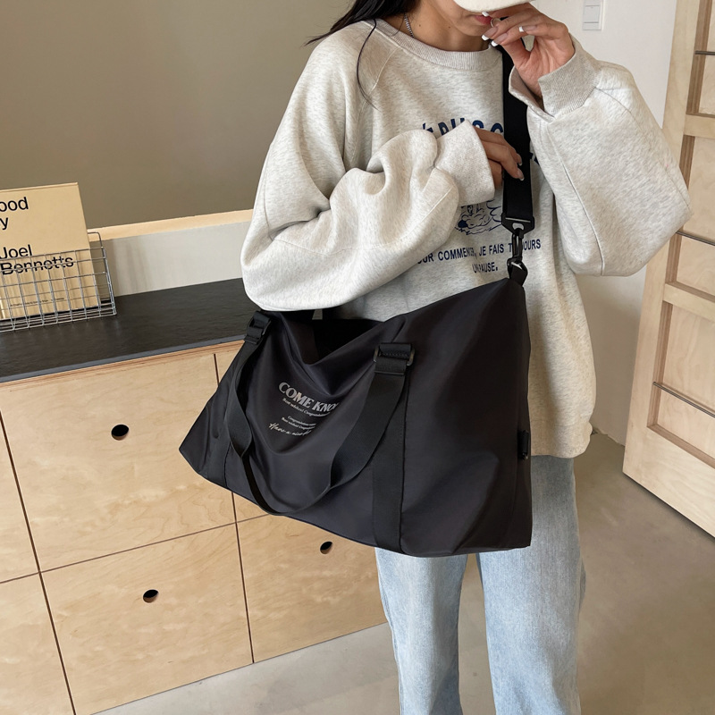 Wholesale of large-capacity fashionable travel bags, business trip boarding short-distance luggage storage bags, lightweight casual sports and fitness bags Specification drawing