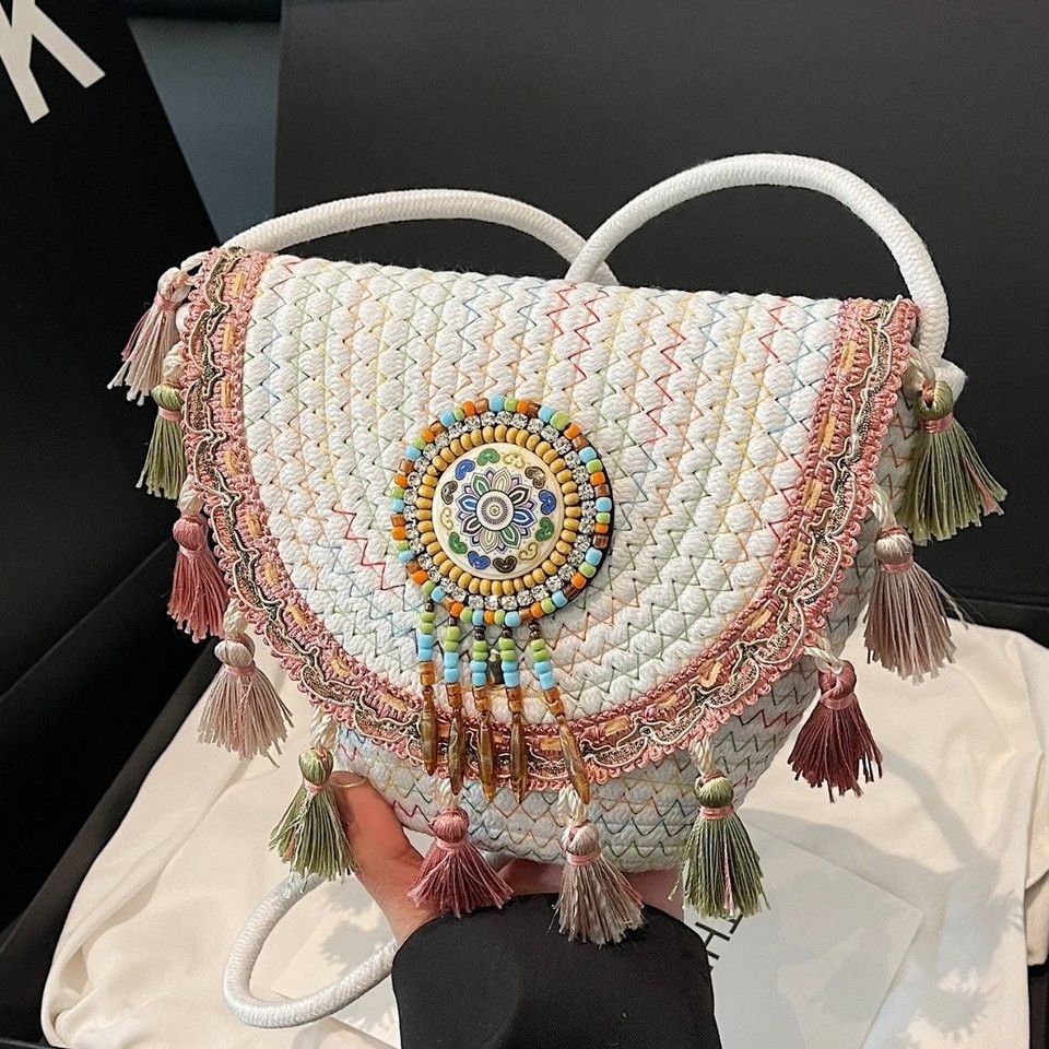 Casual woven bag 2025 Spring New Style straw woven bag, ethnic style niche tassel handbag, texture envelope bag details Picture