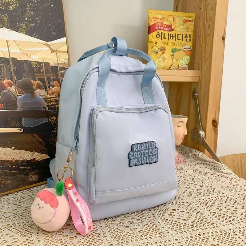 Mini backpacks for college students, small schoolbags for women's commuting and outings, lightweight small backpacks for girls, Korean outdoor travel bags for young girls details Picture