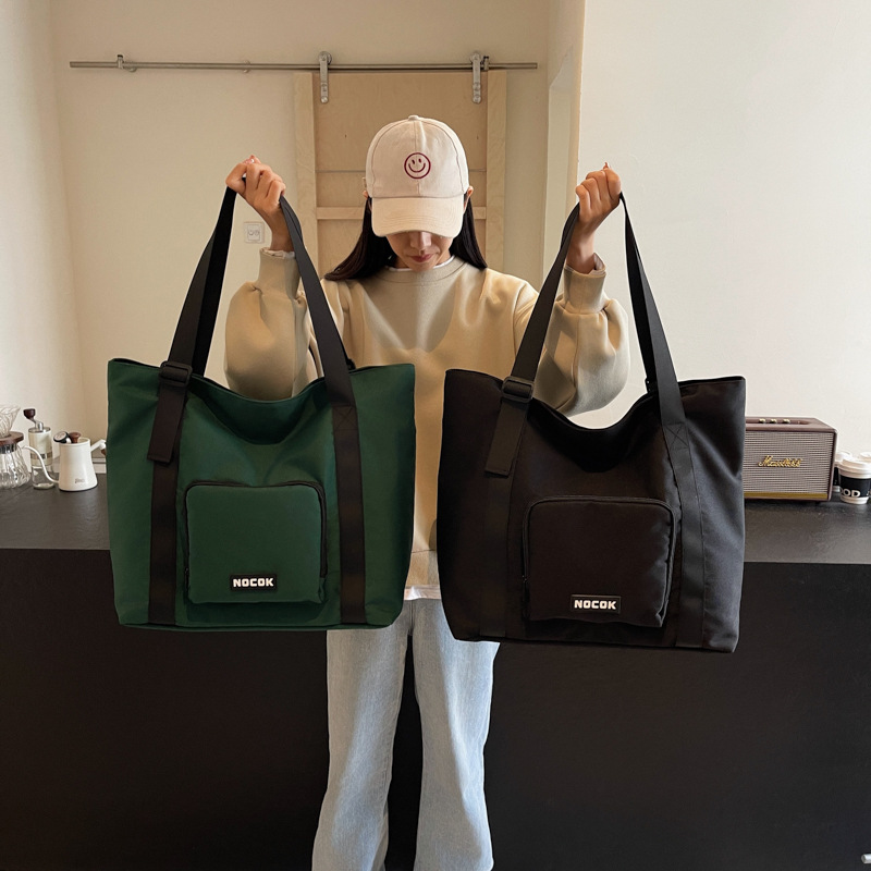 Wholesale large-capacity fashionable fitness bags, lightweight and casual short travel bags, women's foldable boarding hand shoulder bags details Picture