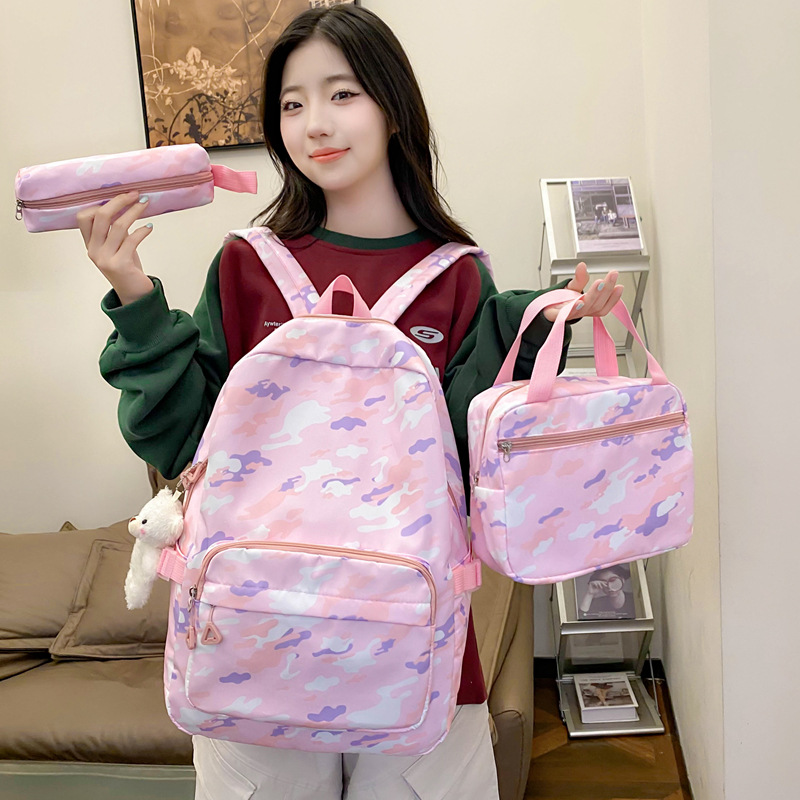 New cross-border three-piece set backpacks for boys and girls, large-capacity and durable backpacks, trendy school bags for primary and junior high schools full figure