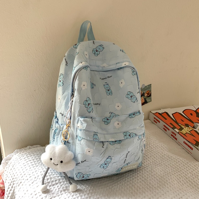 Little Bear schoolbag for primary school students, new niche design backpack for junior high school students, and lightweight color-blocking backpack for college students' computers Application Scenario