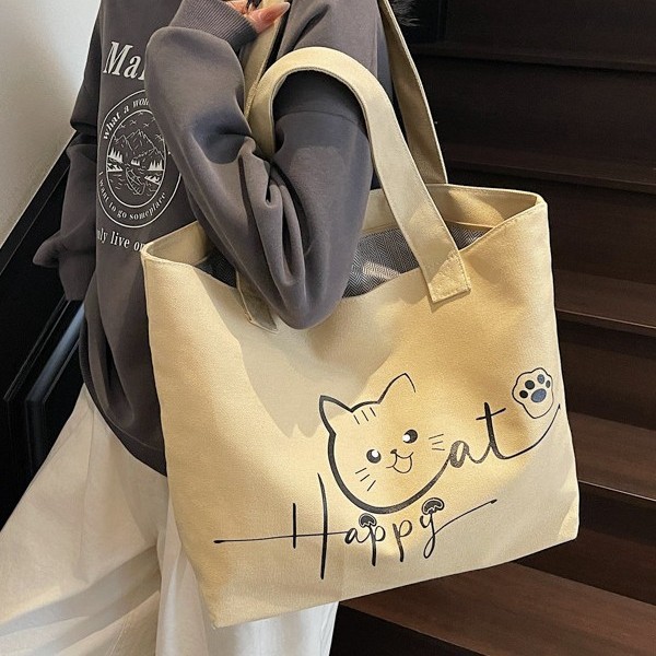 Cute cat-printed large-capacity, simple and fashionable schoolbag, fashionable and individual hand-held shoulder new class bag full figure