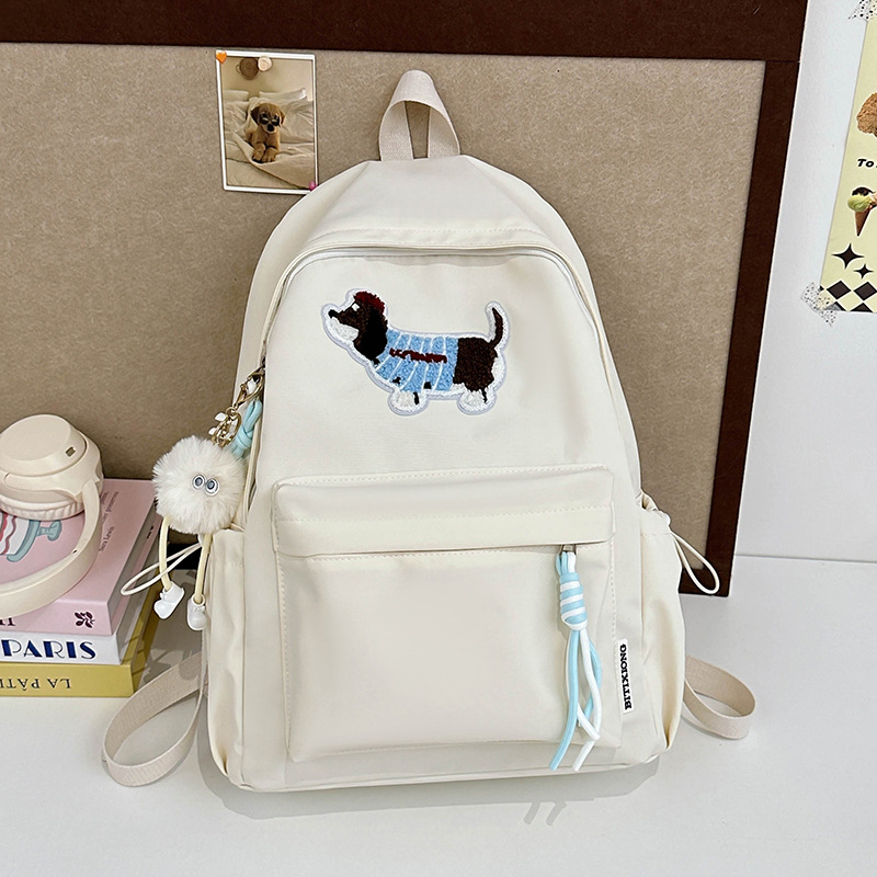 New cartoon schoolbag, cute cartoon Dachshund for junior high school students, large-capacity backpack, and backpack for high school girls attending classes Application Scenario