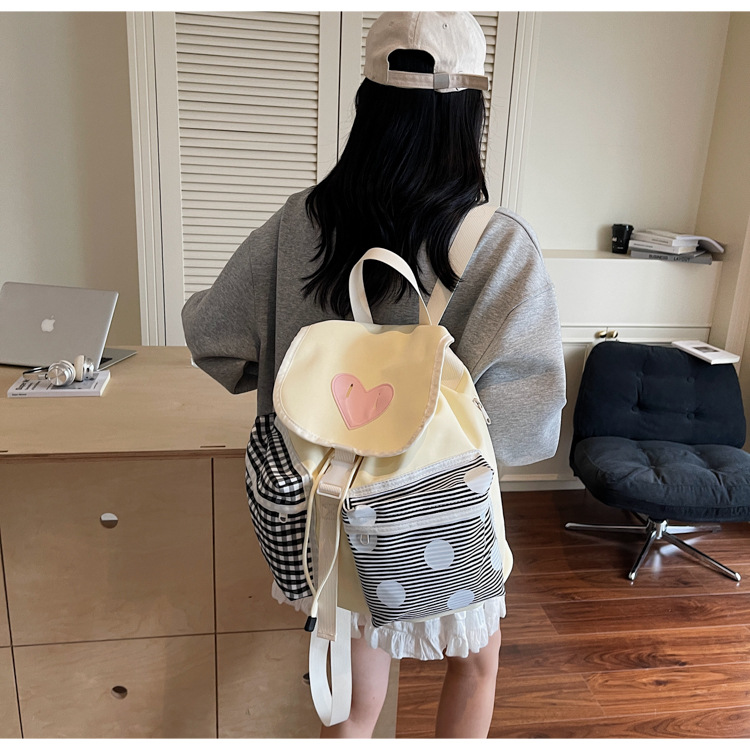 Korean style backpack, fashionable and versatile, high appearance level, cute summer backpack for female college students, new schoolbag color block 2025 full figure