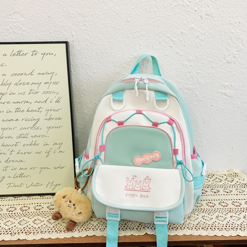 Korean-style children's schoolbag, cute color-blocking backpack for primary school students, large-capacity bag, new travel small backpack for kindergartens full figure
