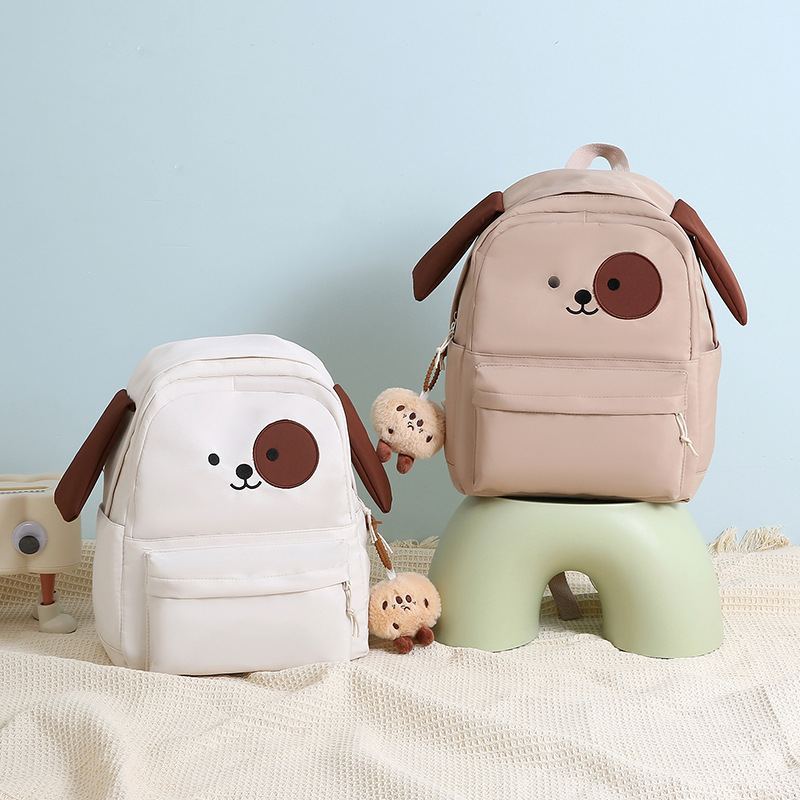 Lightweight puppy schoolbag for girls, cute. Large-capacity backpack for junior high school students and primary school students from grades three to six. Simple backpack full figure
