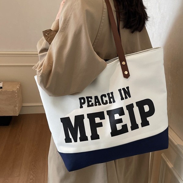New autumn and winter style large-capacity canvas bag with European and American letters, a student hand-held class tutorial bag, fashionable and casual single-shoulder full figure