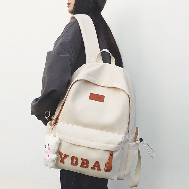 The new 2024 fashionable and versatile backpack for women, a large-capacity travel backpack for junior and senior high school students, and a trend of college students' schoolbags full figure