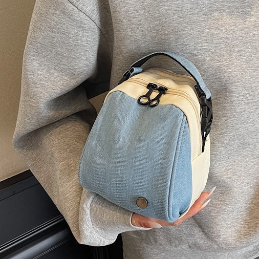 Wholesale of new, simple, large-capacity, eye-catching, lightweight and wear-resistant crossbody bags, versatile for commuting, solid-color cloth bags, single-shoulder bags details Picture